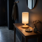 Nordic Linen Shade Table Lamp on an oak entryway console at night