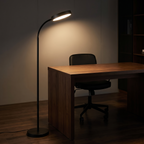 Modern Gooseneck Reading Floor Lamp arching over a walnut desk in a home office