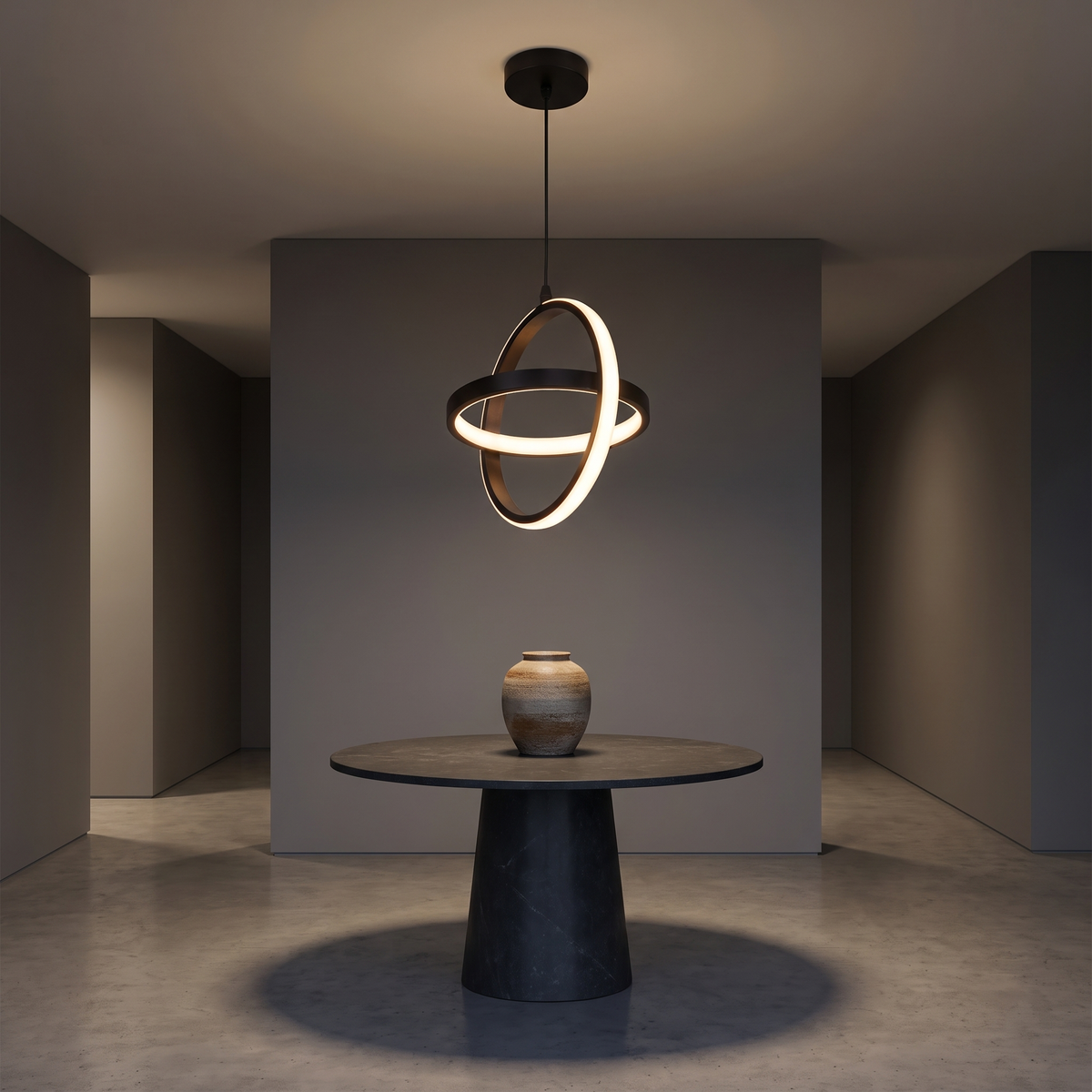 Modern Double Ring Pendant Light above a round stone table in an entrance foyer