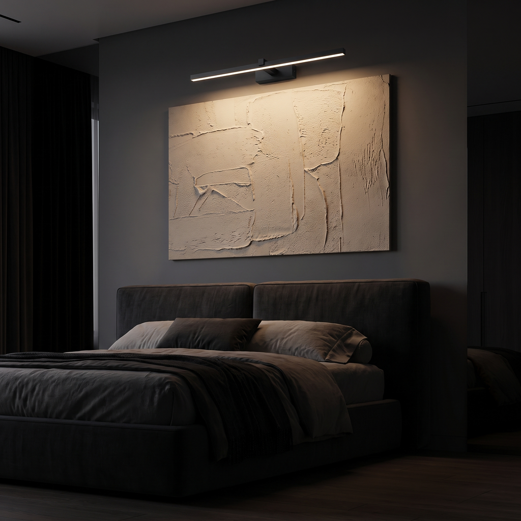 Modern LED Picture Light Bar lighting a canvas above a bed headboard