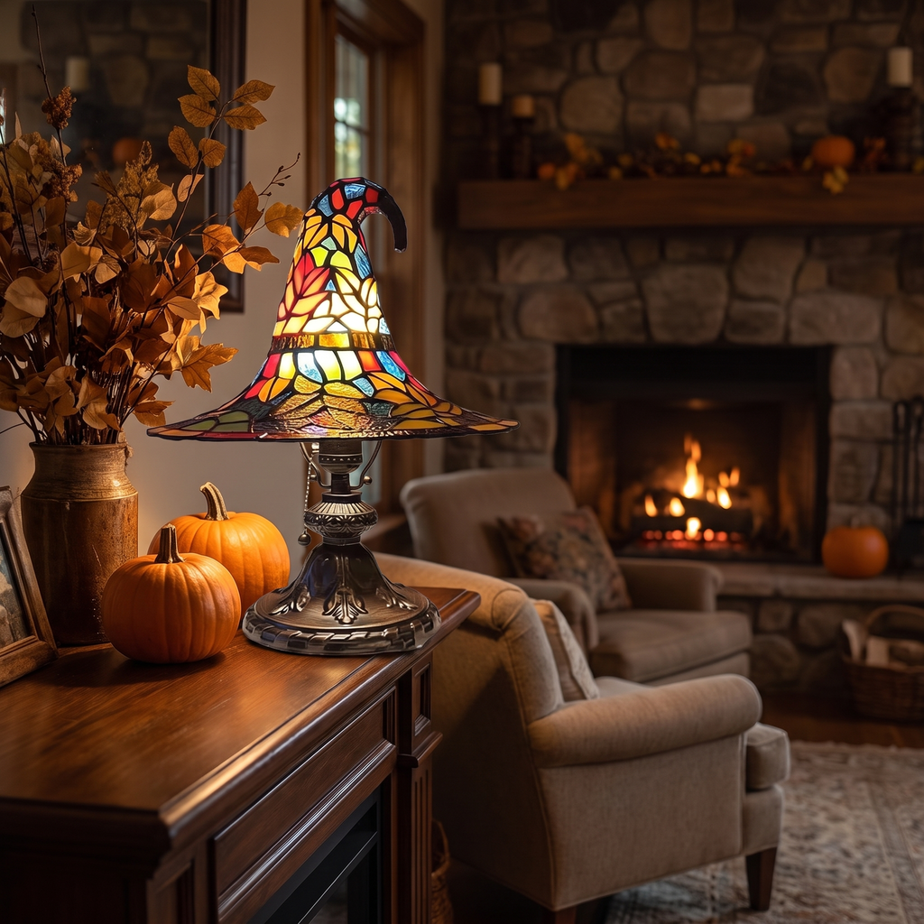 Stained Glass Witch Hat Lamp on a mantel with pumpkins
