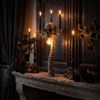 Gothic Skull Candelabra Lamp on a gothic fireplace mantel