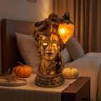 Medusa Table Lamp, Gold on a nightstand at night