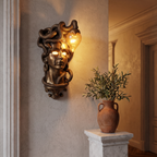 Medusa Wall Lamp, Gold in a hallway with classical Greek decor