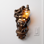 Medusa Wall Lamp, Gold size reference beside a light switch