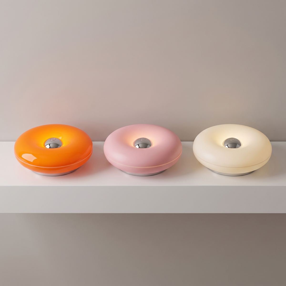 Donut Lamp in Orange, Pink and White on a shelf