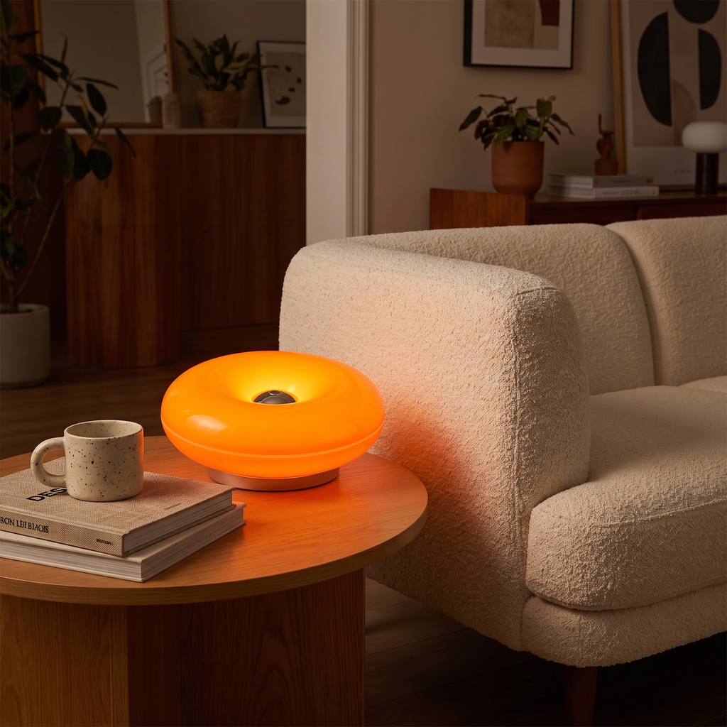 Donut Lamp in Orange on a living room side table