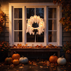 Halloween wreath - Light-Up Ghost Halloween Wreath glowing in a window at night