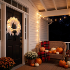 Halloween wreath - Light-Up Ghost Halloween Wreath on a covered front porch at night