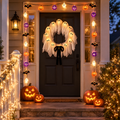 Halloween porch decorations - Front Porch Halloween Bundle: ghost wreath, Halloween string lights and fairy lights on a front door at dusk