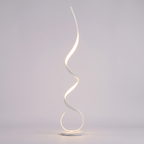 White spiral sculptural LED table lamp on a plain grey studio background