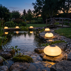 Solar garden light - Solar Cobblestone Garden Light along a pond edge